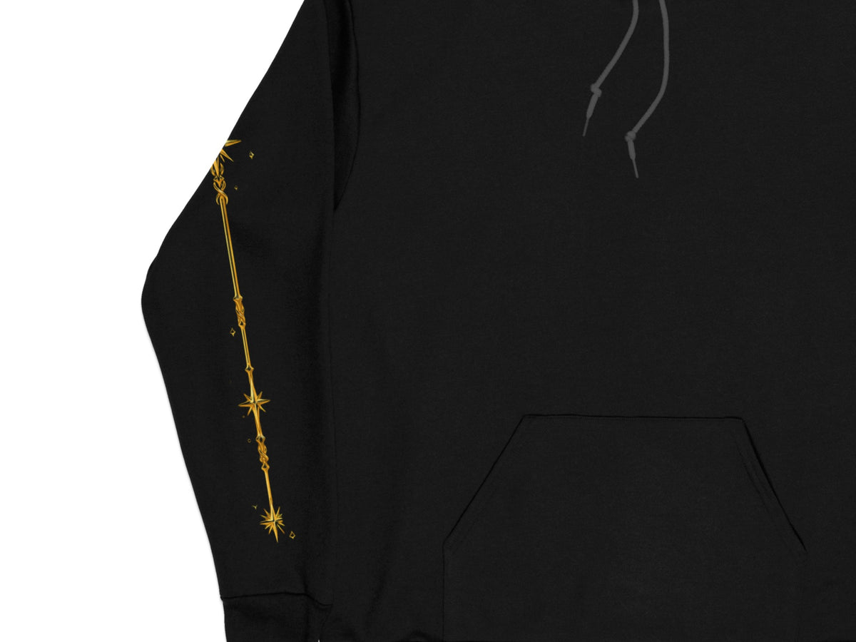 Black hoodie with gold celestial constellation graphic down the left sleeve.