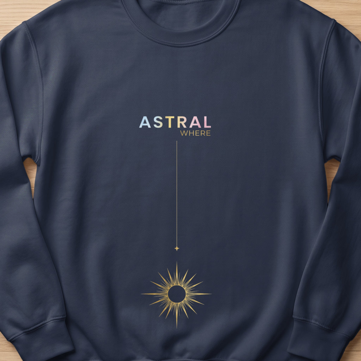 Navy sweatshirt with "ASTRAL WHERE" text and a gold sun graphic.