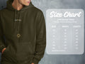 Olive green hoodie with 'Astral' logo and sun graphic, shown with size chart.