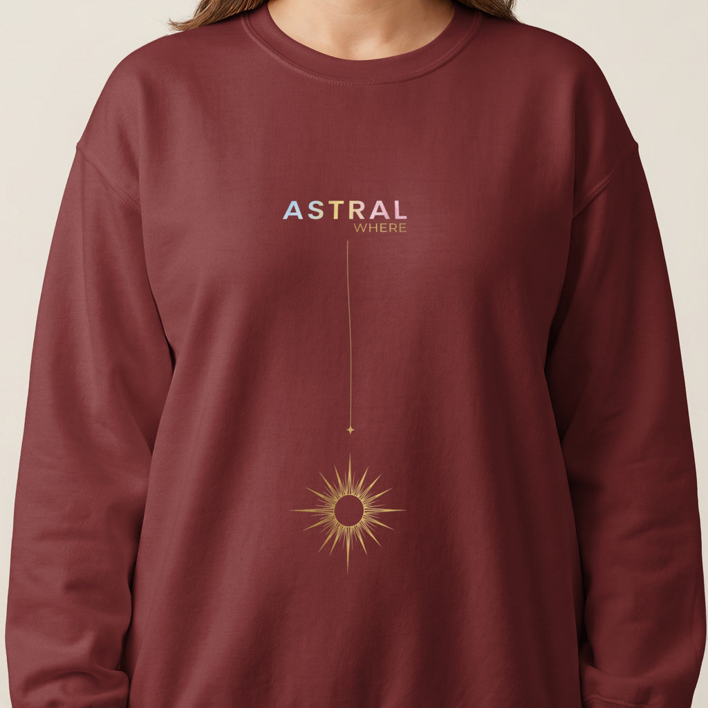 Maroon sweatshirt with "ASTRAL WHERE" text and a golden sunburst graphic.